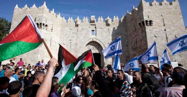 Israeli and Palestinian flags in Jerusalem